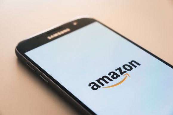 Amazon - black Samsung Galaxy smartphone displaying Amazon logo